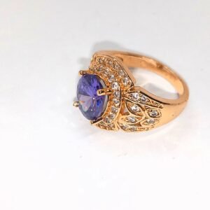 Elegant Blue Stone Ring with Golden Glow